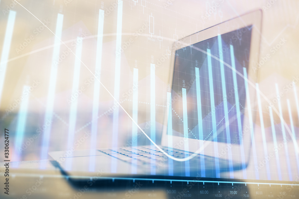 Forex Chart hologram on table with computer background. Multi exposure. Concept of financial markets. Forex Chart hologram on table with computer background. Multi exposure. Concept of financial markets.