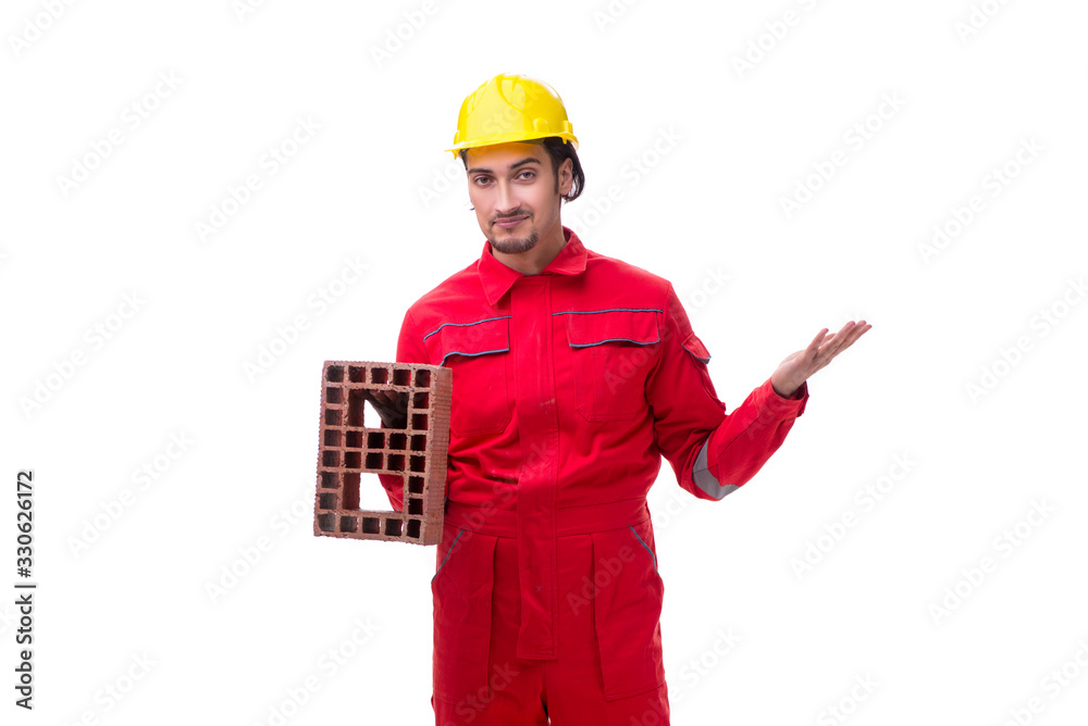 Young male mason with brick isolated on white Young male mason with brick isolated on white