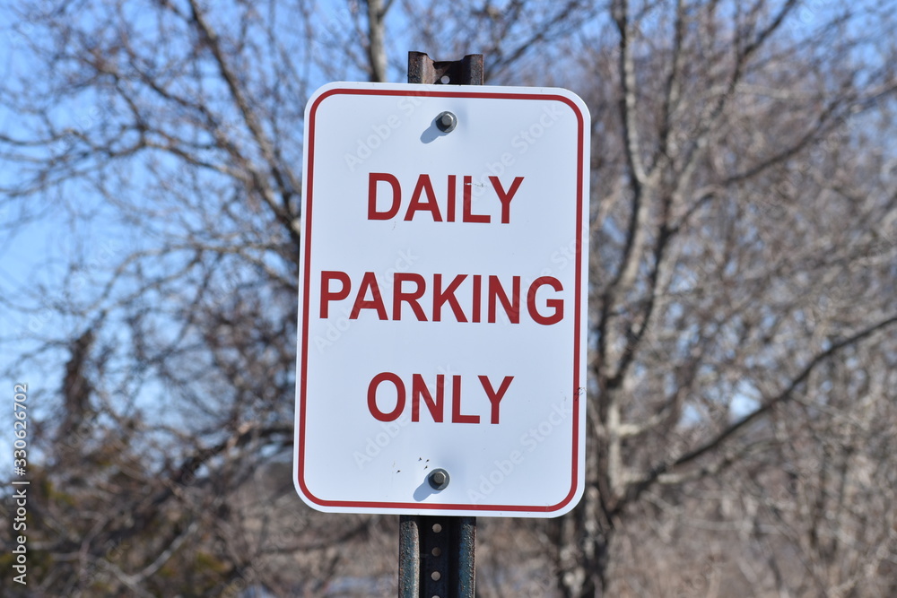 daily parking only metal sign