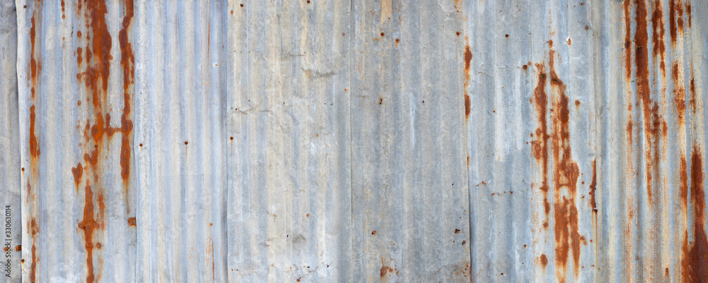 Old rusty zinc sheets for textured background.