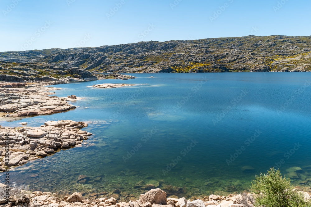 Fototapeta premium Lagoa Comprida is the largest lake of Serra da Estrela Natural park, Portugal.