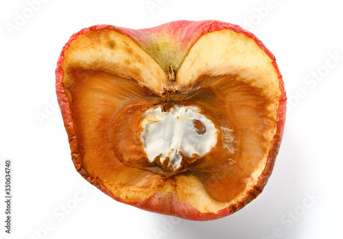 top view overripe apple with rotten core on white background