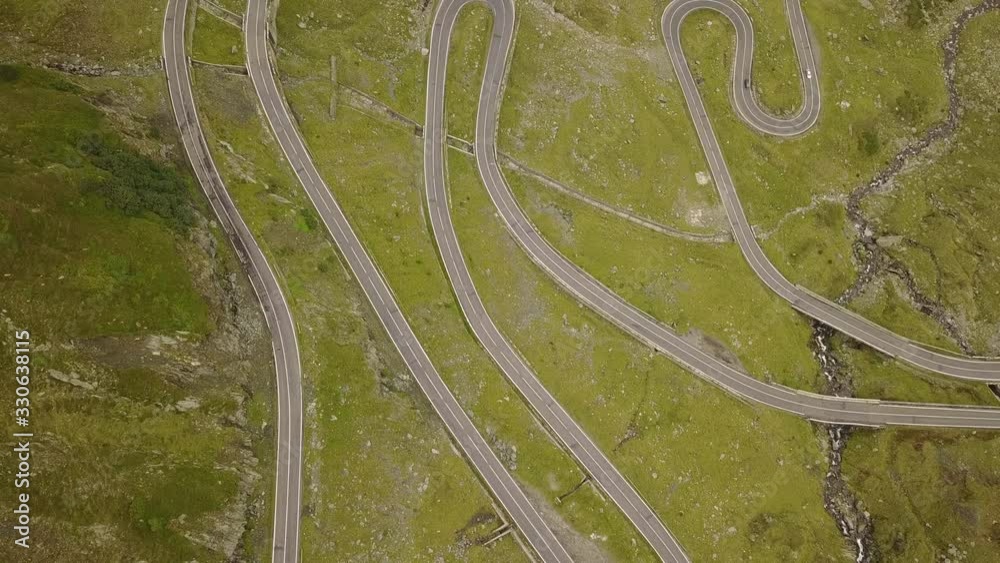 Vertical Aerial Rising Over Winding Transfagarasan Highway Into Clouds Vertical Aerial Rising Over Winding Transfagarasan Highway Into Clouds
