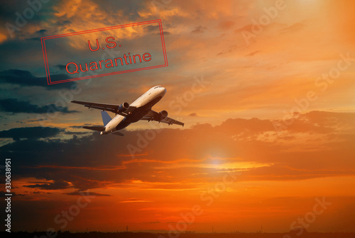 Canceled travel US quarantine with coronavirus COVID-19 Airplane in the sky in dramatic sunset and sunrise sky.