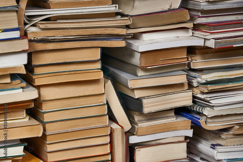 Obraz premium Pile of old books in the attic