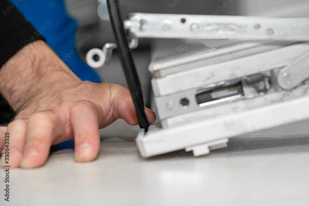 Professional master at repair and installation of windows, changes rubber seal gasket in pvc windows Professional master at repair and installation of windows, changes rubber seal gasket in pvc windows