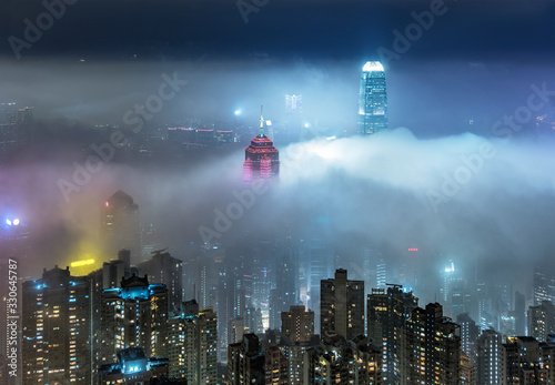 Photography Skyline of Victoria harbor of Hong Kong city in fog