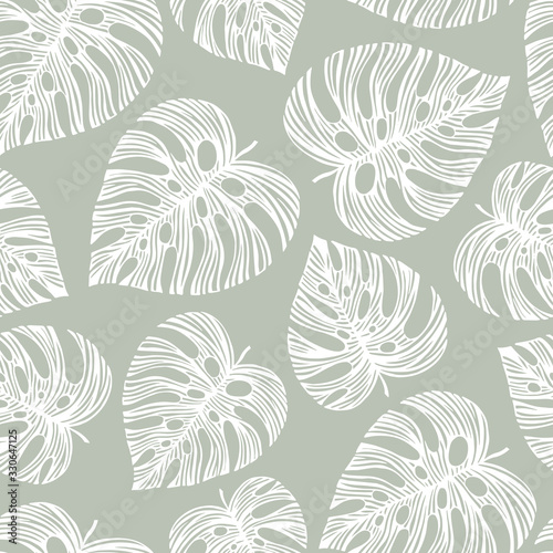Tropical trendy seamless pattern with exotic palm leaves. Vector.
