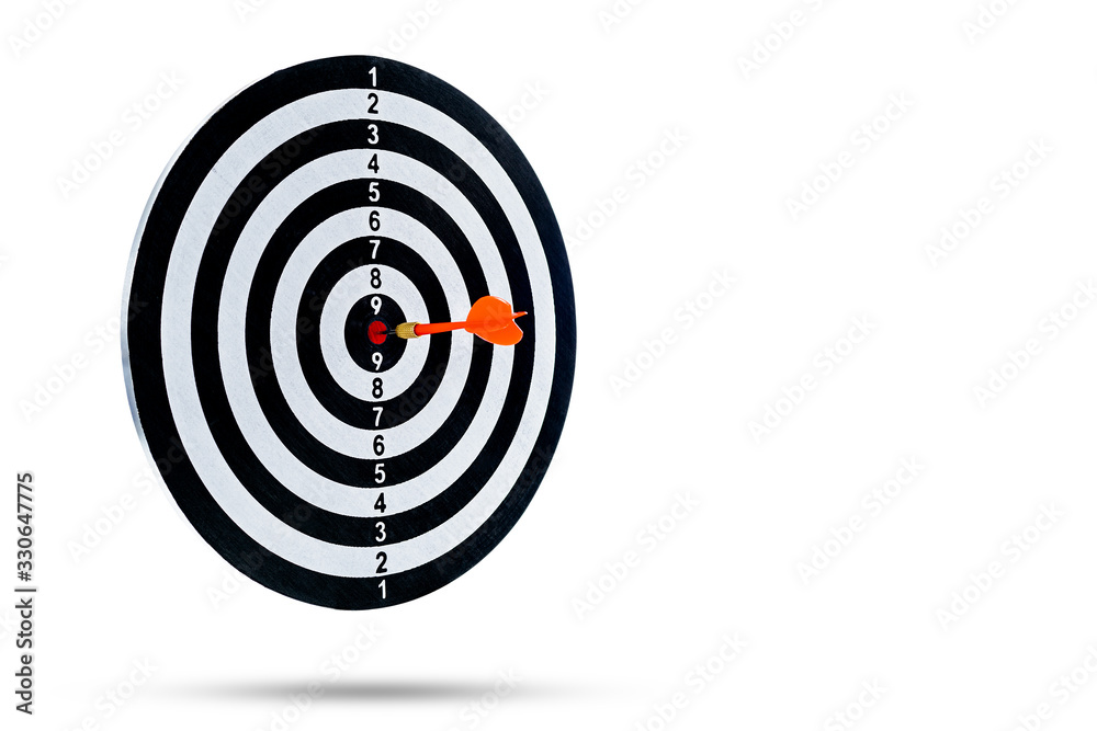 Red dart arrow hitting in the target center is Dart board Isolated on White background Red dart arrow hitting in the target center is Dart board Isolated on White background