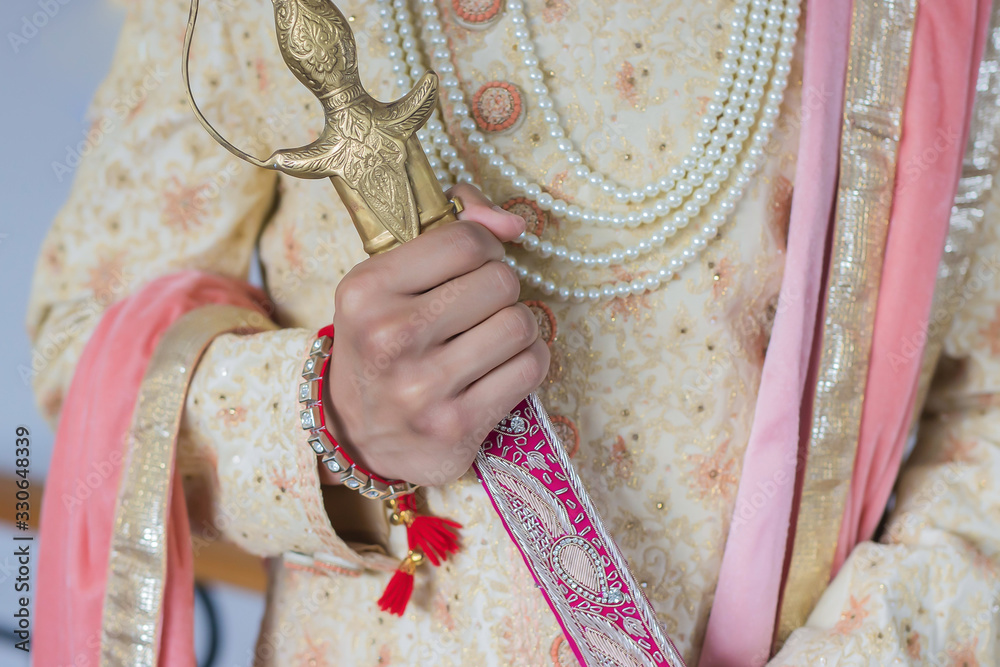 Indian Punjabi Sikh groom's wedding sword