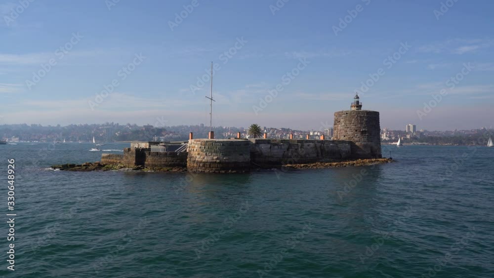 The Historic Fort Denison, Also Called Pinchgut Island, Surrounded By The Calm Blue Sea In Sydney Harbour National Park, Sydney, Australia - Panoramic Shot The Historic Fort Denison, Also Called Pinchgut Island, Surrounded By The Calm Blue Sea In Sydney Harbour National Park, Sydney, Australia - Panoramic Shot