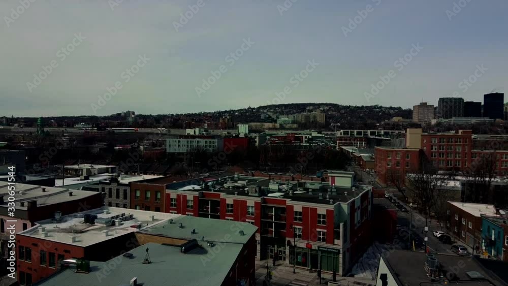Drone push out of Montreal city with mount royal in the background. Drone push out of Montreal city with mount royal in the background.