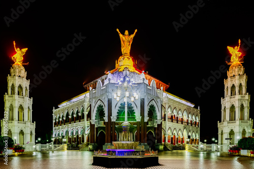 Beautifully illuminated  St. George's Syro Malabar Forane Church, locally known as Edapally Church is a Catholic pilgrimage church in Kochi, India. photo