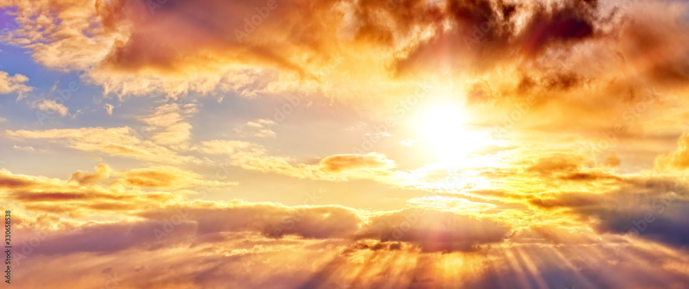 dramatic sunset sky landscape background natural color of evening  cloudscape panorama with setting sun rays highlighting clouds ultra wide  panoramic view Stock Photo | Adobe Stock