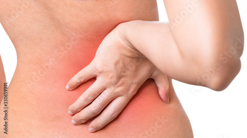 Back view of woman suffering from back pain and hand touch her back isolate on white background, Clipping path, Back ache concept.