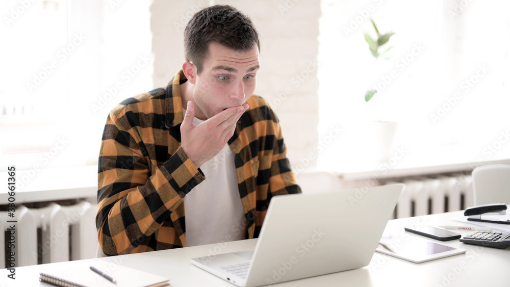 The Shocked Casual Young Man in Awe at Work The Shocked Casual Young Man in Awe at Work