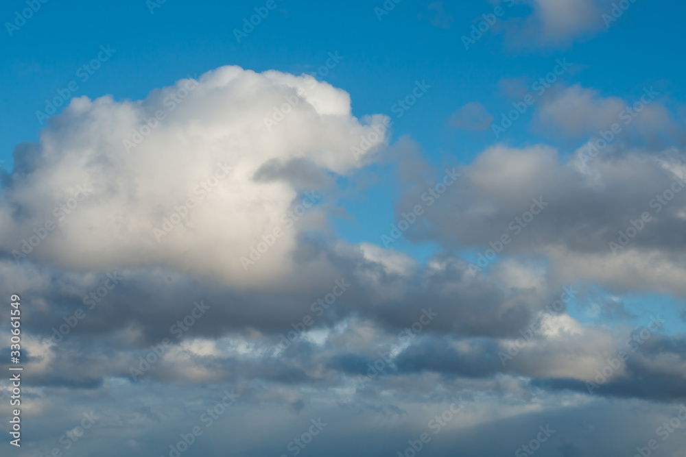 Cumulus clouds in a blue sky