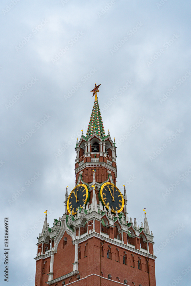 Spasskaya tower in Moscow on Red Square in cloudy weather Spasskaya tower in Moscow on Red Square in cloudy weather