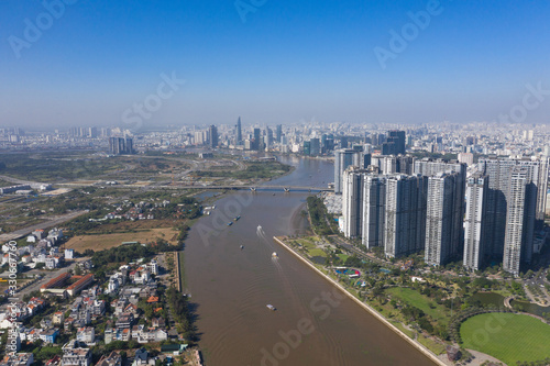 Top view aerial photo from flying drone of a Ho Chi Minh City with development buildings  transportation  energy power infrastructure