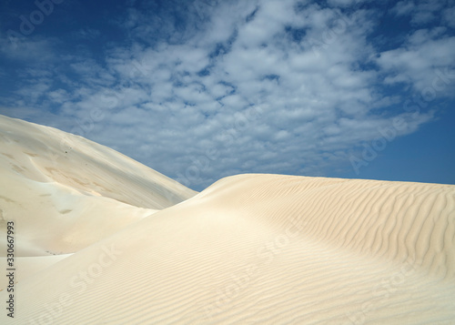 Fototapeta Naklejka Na Ścianę i Meble -  Massive sand dunes at Arher Beach in Socotra World Heritage Site in Yemen