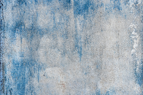 metal sheet background with peeling paint flakes