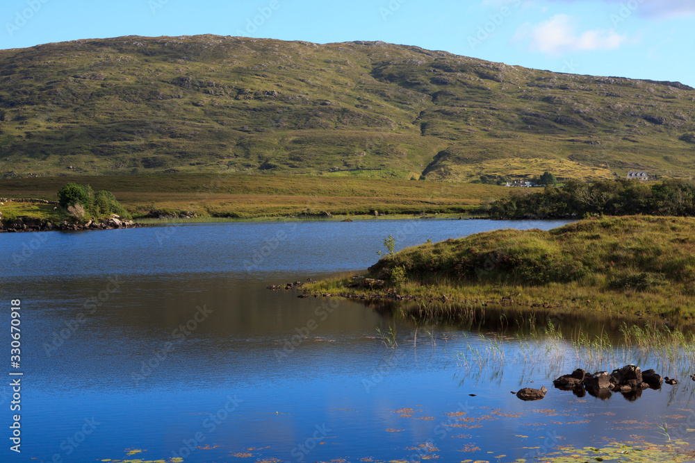 Connemara (Ireland), - July 20, 2016: Connemara landscape, Co. Galway, Ireland Connemara (Ireland), - July 20, 2016: Connemara landscape, Co. Galway, Ireland