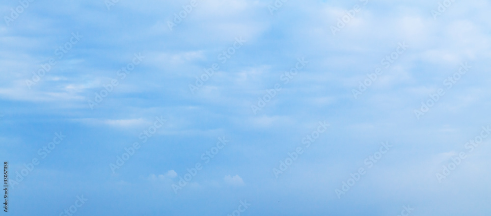 Blue sky with layers of clouds at daytime Blue sky with layers of clouds at daytime