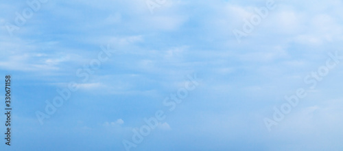 Blue sky with layers of clouds at daytime