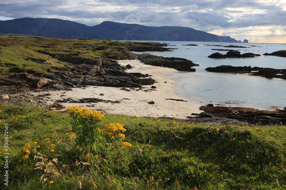 Connemara (Ireland), - July 25, 2016: Beach in Connemara, Co. Galway, Ireland Connemara (Ireland), - July 25, 2016: Beach in Connemara, Co. Galway, Ireland