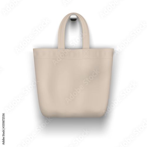 Textile beige tote bag hanging on the wall realistic vector mockup for shopping design.