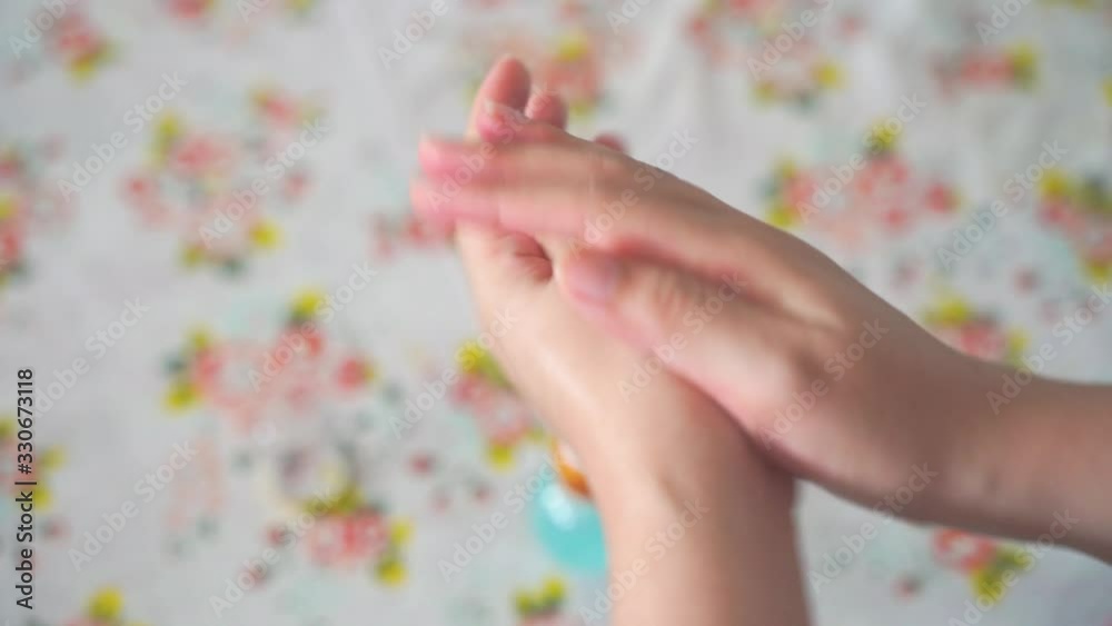 Woman's hand washing Hands by using alcohol gel , man using alcohol gel clean wash hand antiviral bacteria and avoid infections Woman's hand washing Hands by using alcohol gel , man using alcohol gel clean wash hand antiviral bacteria and avoid infections