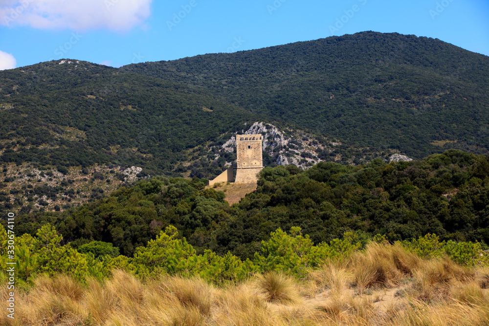 Alberese (GR), Italy - June 10, 2017: Collelungo tower in Uccellina Natural Reserve, Alberese, Grosseto, Tuscany, Italy, Europe