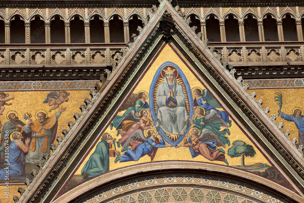 Orvieto (TR), Italy - May 10, 2016: A particular of Orvieto cathedral facade, Terni, Umbria, Italy