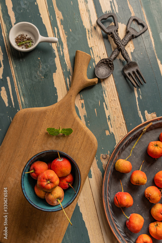 Red hawthorn on the wooden table