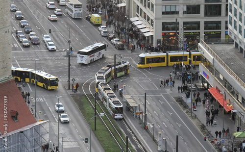 Photography BERLIN, GERMANY on December 31, 2019: People pass tram ways in the city centre of Berlin