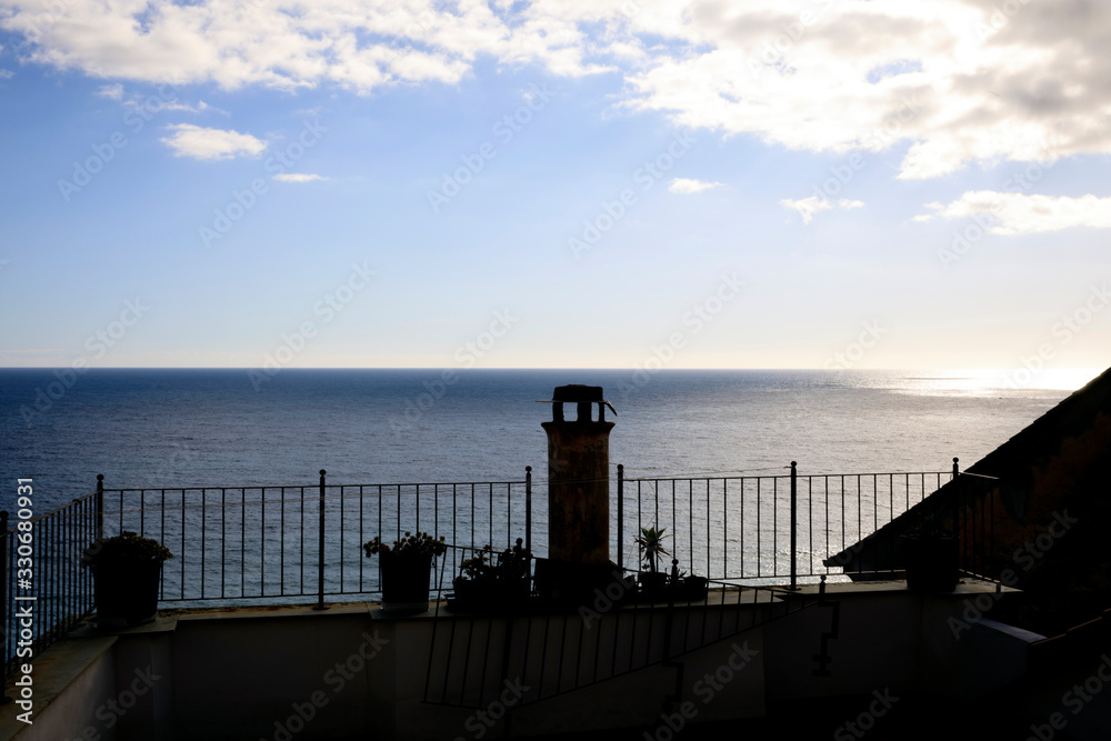 Cervo (IM), Italy - December 30, 2017: A terrace on the sea in Cervo village, Italian Riviera, Imperia, Liguria, Italy