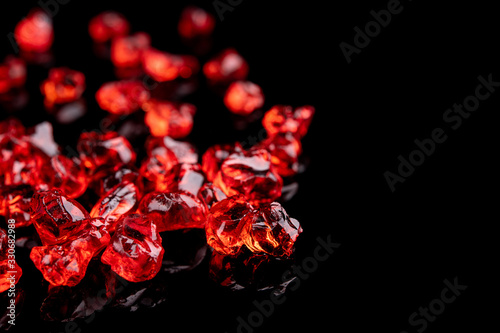 Closeup of red gems stone garnet isolated