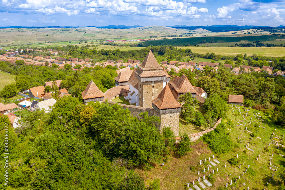 Viscri village church and cemetery in the traditional saxon village Viscri near Brasov, Romania