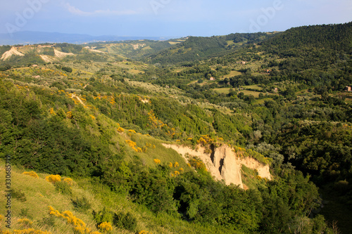 Civita di Bagnoregio (VT), Italy - May 15, 2016: Soft eroded clay landscape around Civita di Bagnoregio, Tuscia, Lazio, Italy