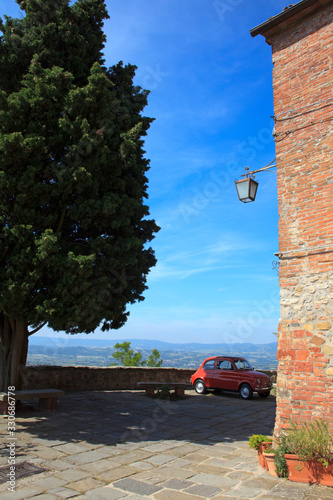 Monteleone d' Orvieto (TR), Italy - May 27, 2016: A red FIAT 500 in Monteleone d' Orvieto square, Orvieto, Terni, Umbria, Italy