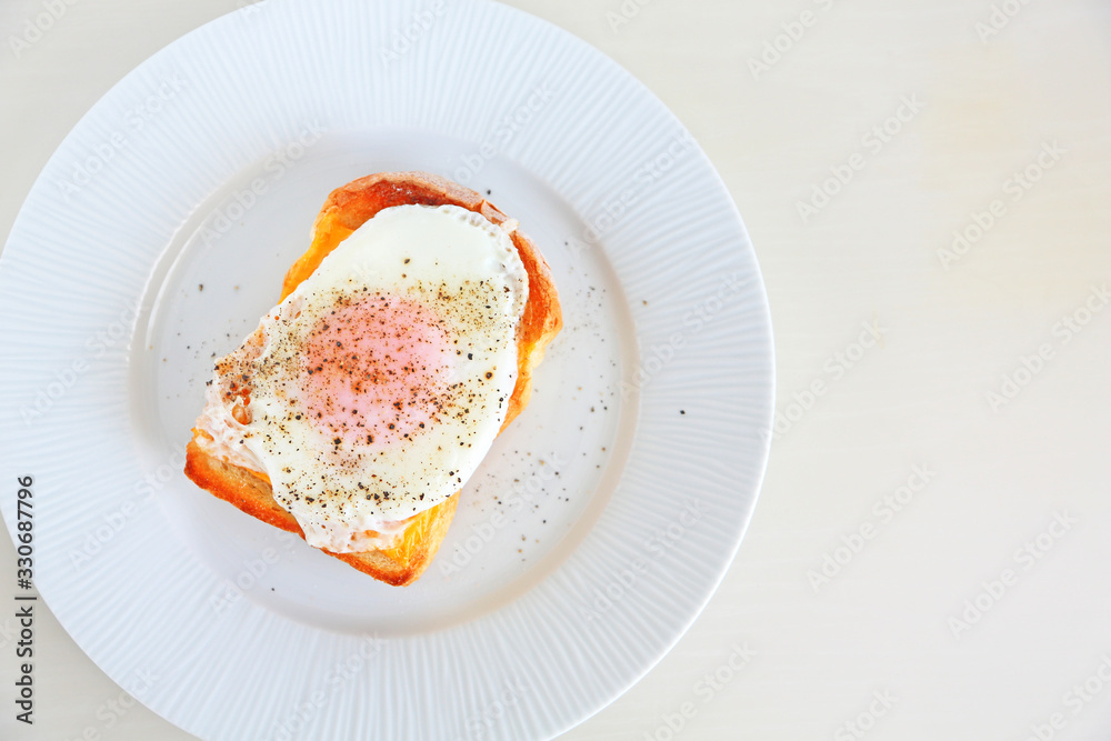 Simple egg cheese toast shot from overhead Simple egg cheese toast shot from overhead