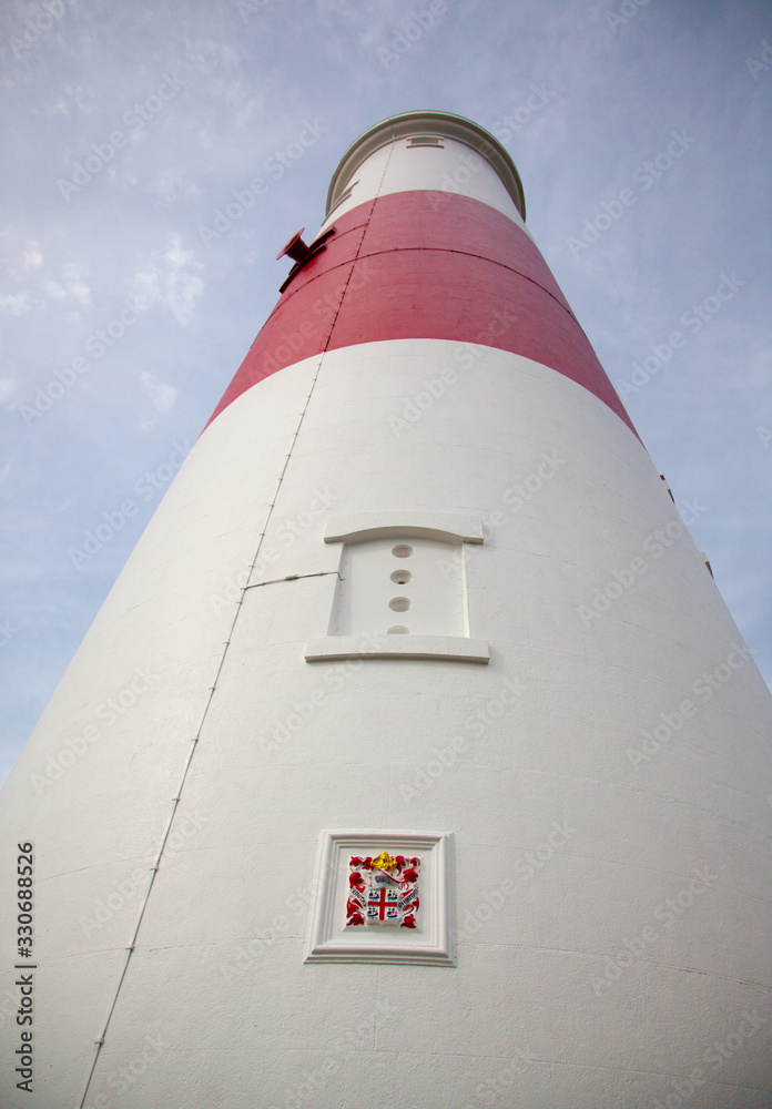 Portland Bill lighthouse in Dorset , England seen from below looking straight up in close-up