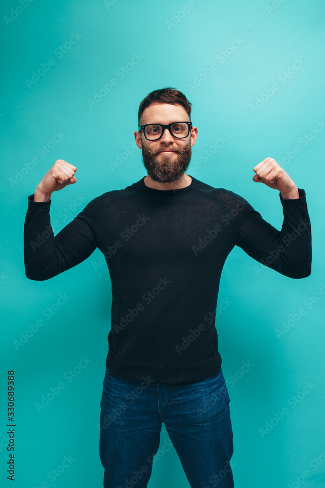 Handsome american hipster guy with beard wearing black long sleeve t-shirt or sweater with space for your brand name or label. Mockup for print