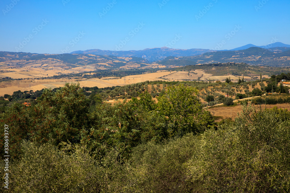 Montemerano (GR), Italy - September 11, 2017: Hills landscape and country around Montemerano village, Manciano, Grosseto, Tuscany, Italy, Europe