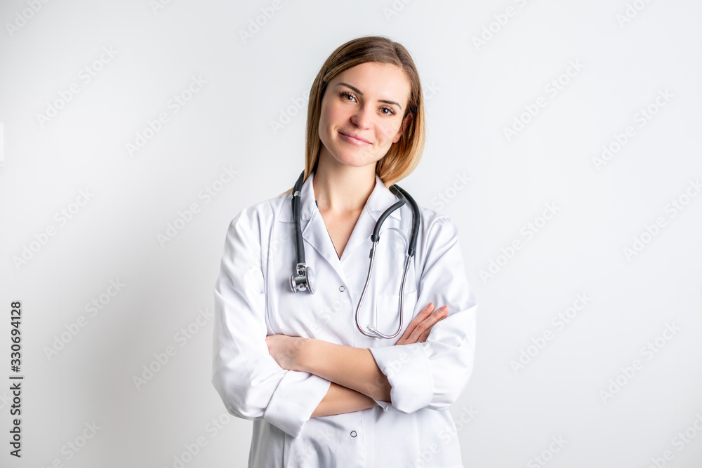 Medical concept of young female doctor in white coat with stethoscope Medical concept of young female doctor in white coat with stethoscope