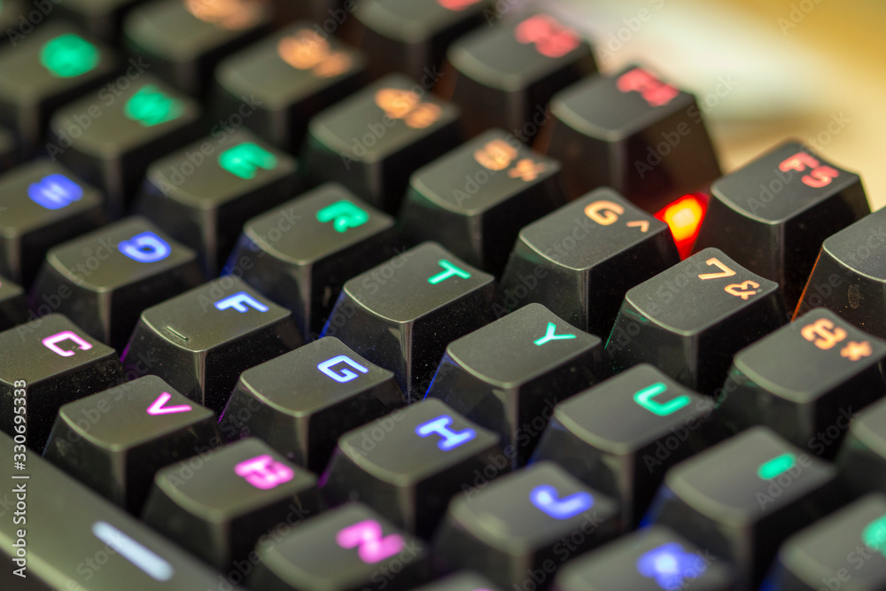 Photo of isolated dusty mechanical computer keyboard.