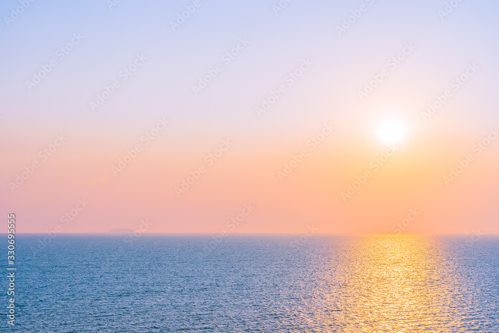 Beautiful sunset or sunrise around sea ocean bay with cloud on sky