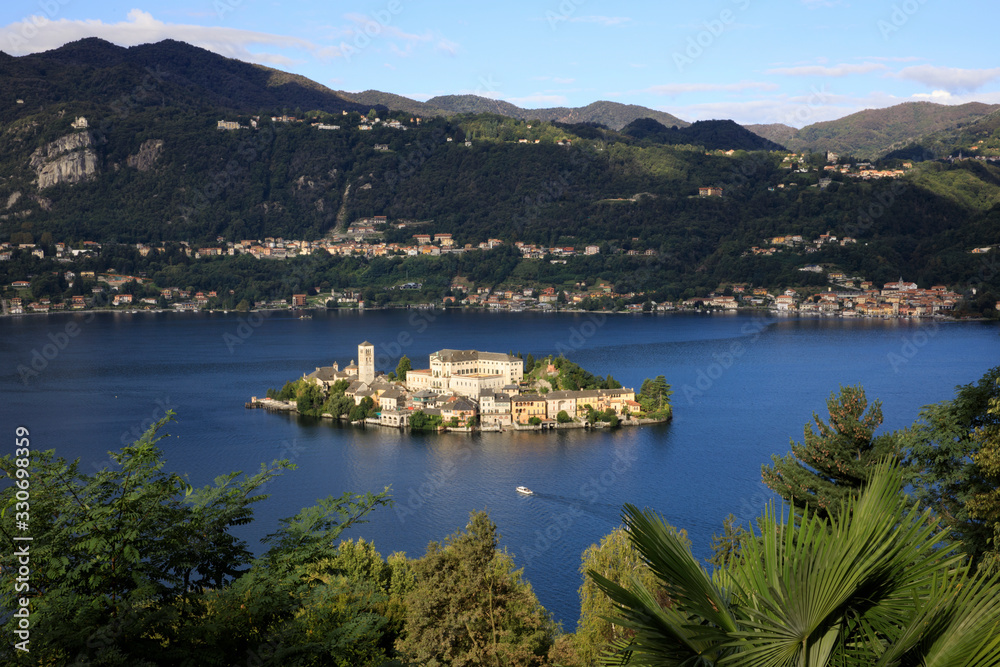 Orta San Giulio (NO), Italy - September 02, 2019: Landscape of San Giulio Island on Lake Orta, Novara, Piedmont, Italy