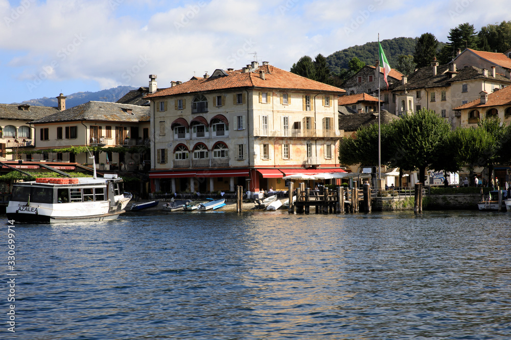 Orta San Giulio (NO), Italy - September 02, 2019: The little port in Orta lake, Orta, Novara, Piedmont, Italy