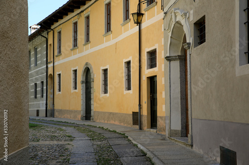 Orta San Giulio (NO), Italy - September 02, 2019: A typical small road in Orta San Giulio island, Orta, Novara, Piedmont, Italy © PaoloGiovanni